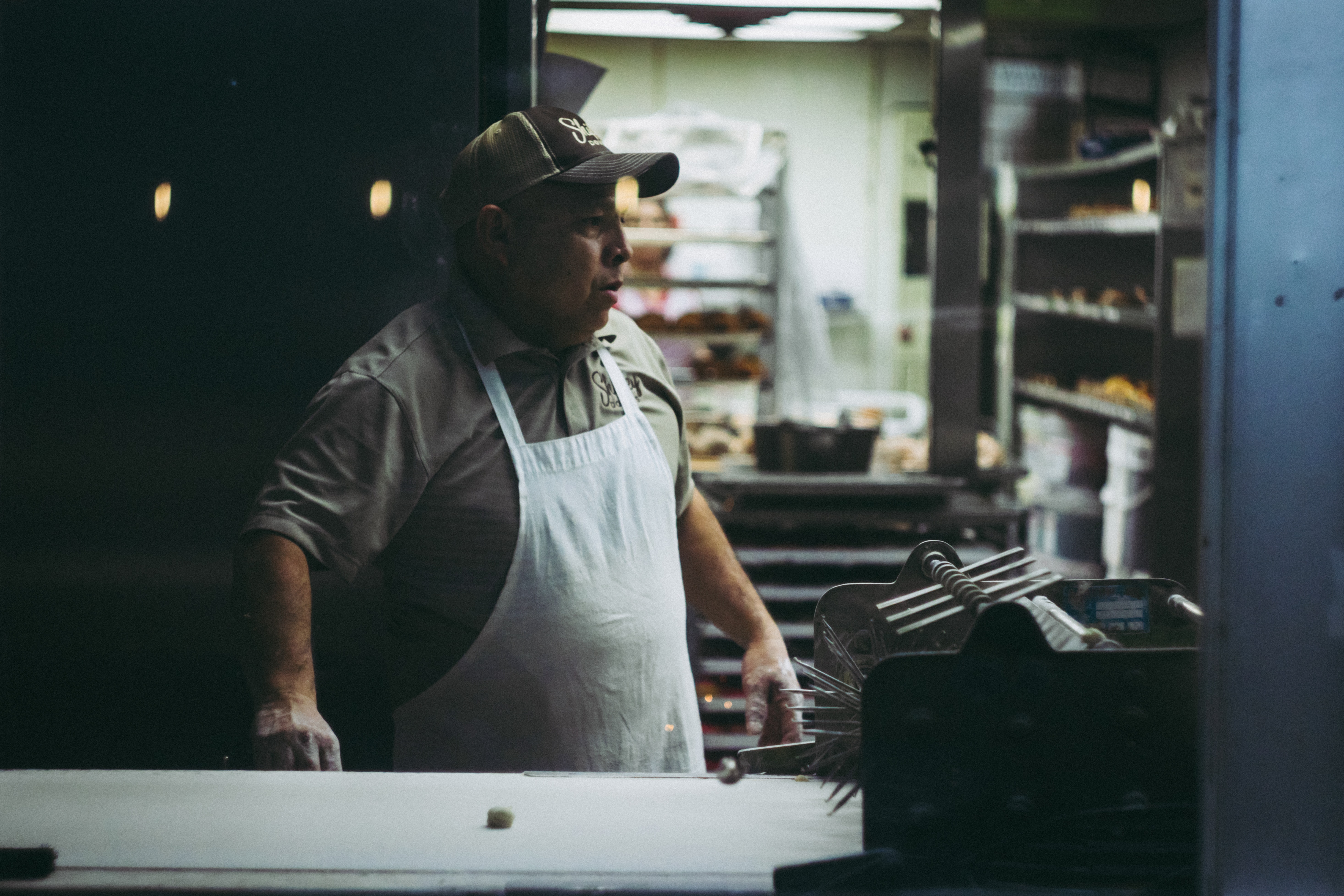 pictures of people in donut kitchen